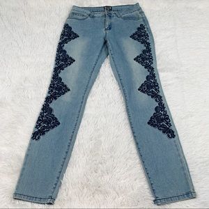 A.Z.I mid rise back floral embroidered blue jeans light wash